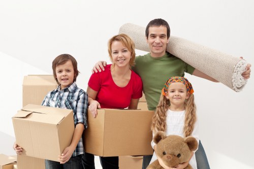 Professional office removals team handling commercial furniture in Goodmayes